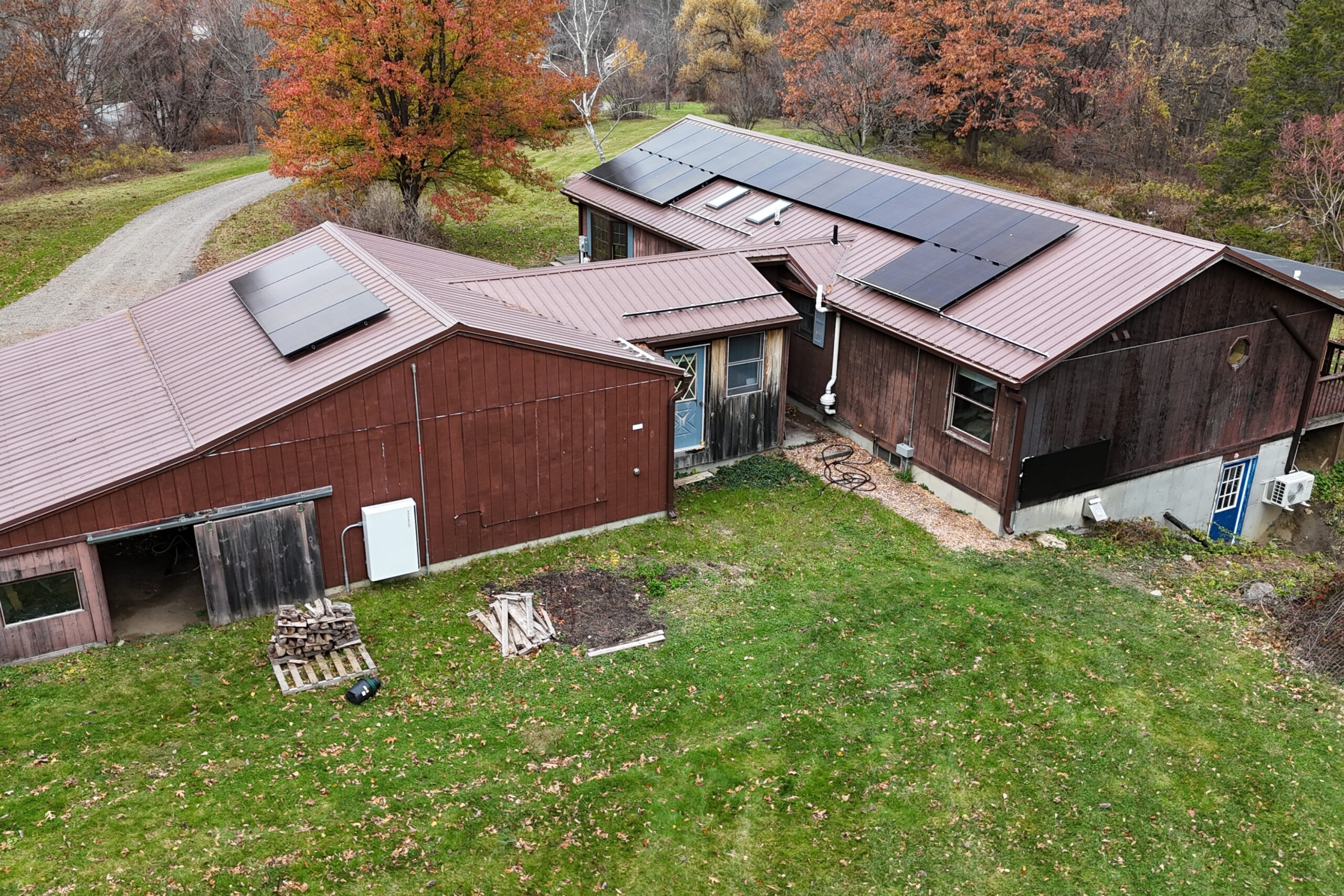 Commercial rooftop solar array under maintenance